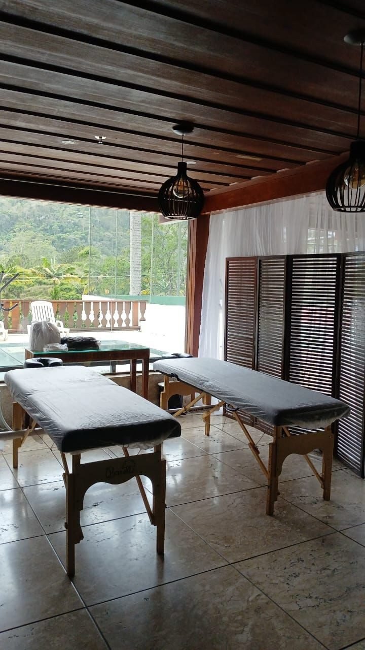 Equipe Zen Viver em atendimento premium de bem-estar em hotel/resort, no Rio de Janeiro — quick massage e spa corporativo para hotéis e resorts.